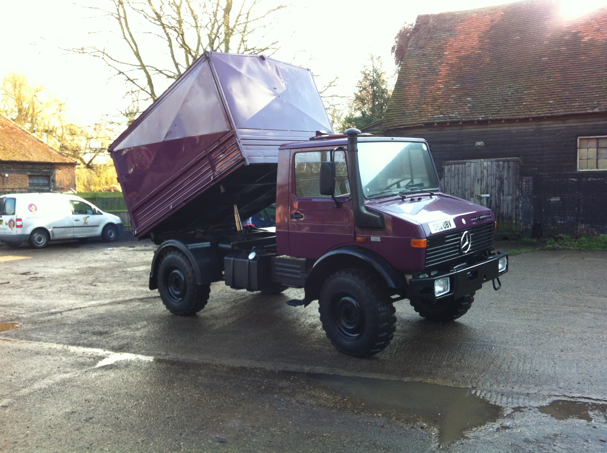 Unimog U1300L with rear tipping load body